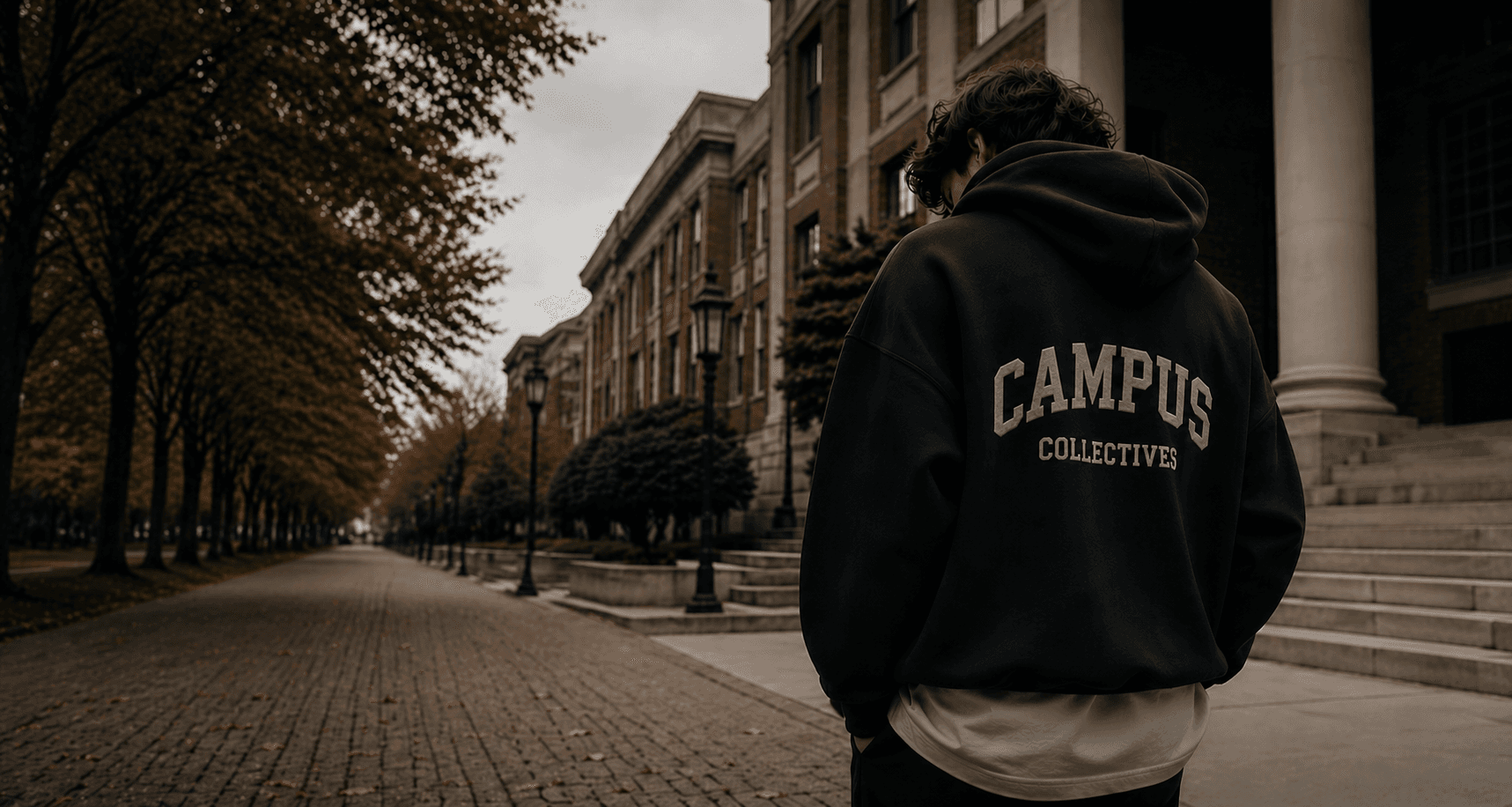 Campus Collectives hoodie on a campus walkway